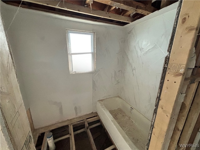 bathroom featuring a bath