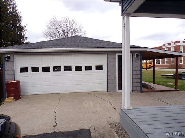 garage featuring a carport