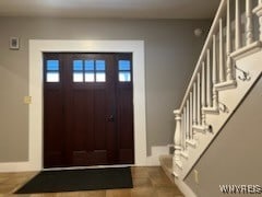 view of tiled foyer entrance