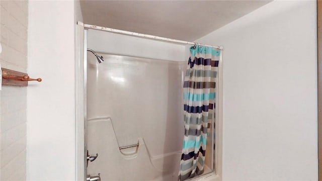 bathroom with curtained shower