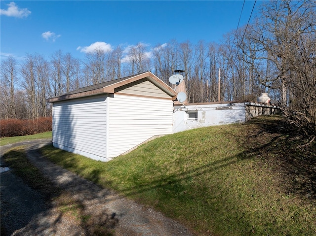 view of property exterior featuring a yard