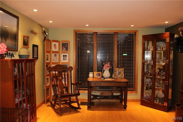 sitting room with light hardwood / wood-style floors