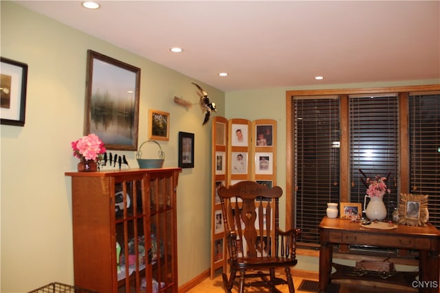 sitting room featuring hardwood / wood-style flooring