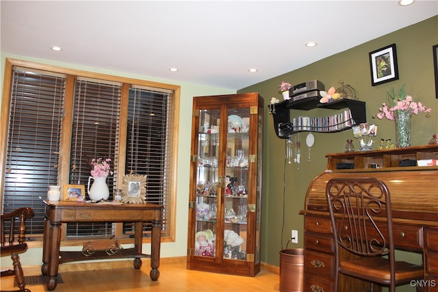 office space with light hardwood / wood-style flooring