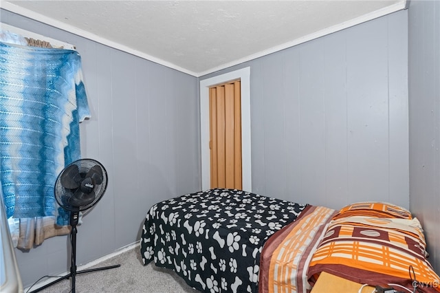 carpeted bedroom with crown molding