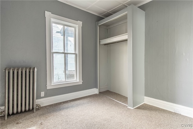 closet featuring radiator heating unit