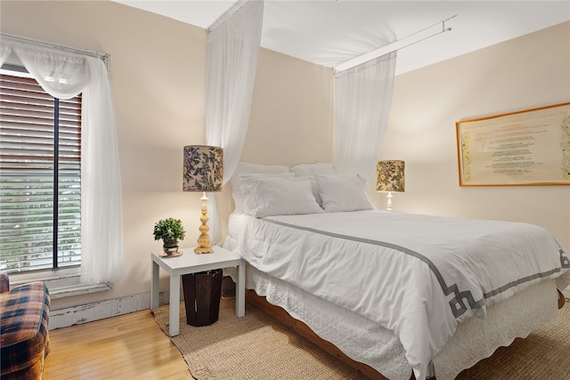 bedroom featuring wood-type flooring