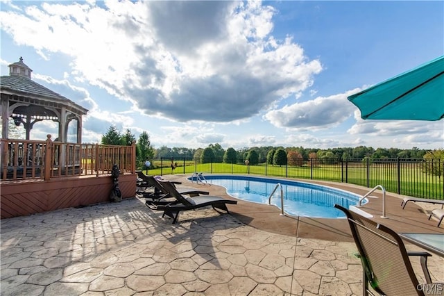 view of pool featuring a gazebo and a patio