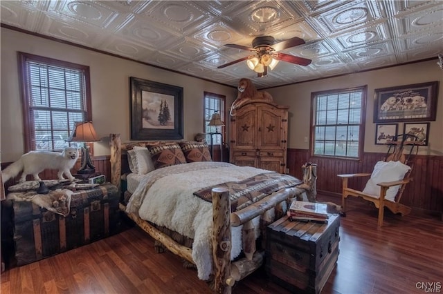 bedroom with ceiling fan and dark hardwood / wood-style floors