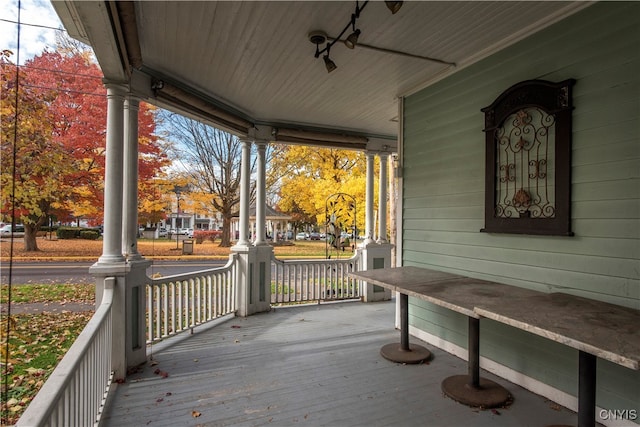 wooden deck featuring a porch