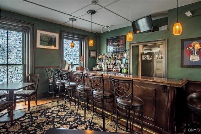 8 E Park, Kirkland, NY 13323 - community bar area with track lighting, wood finished floors, fridge, and decorative light fixtures