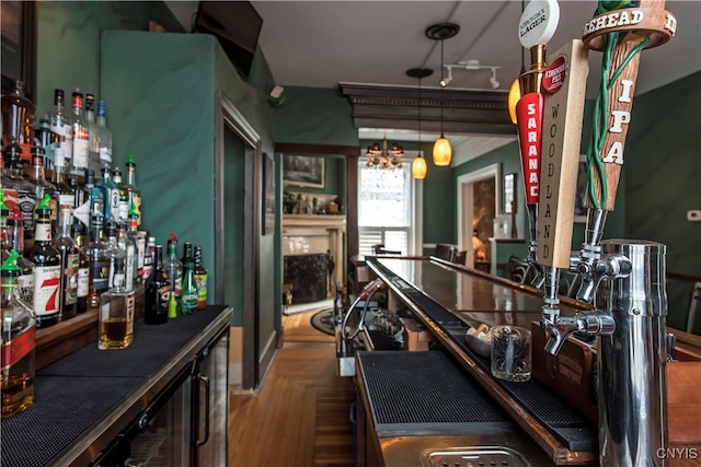 bar featuring parquet flooring