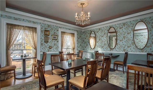 8 E Park, Kirkland, NY 13323 - dining area with wainscoting, a chandelier, wood finished floors, ornamental molding, and wallpapered walls