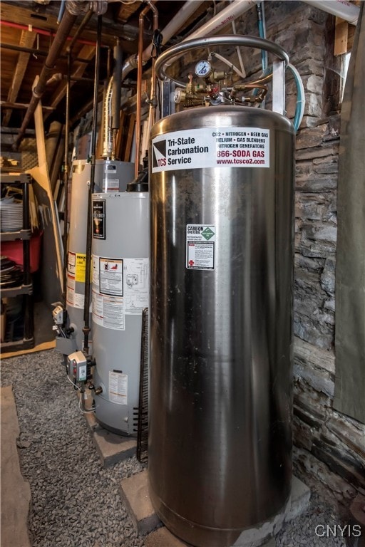 utility room with gas water heater