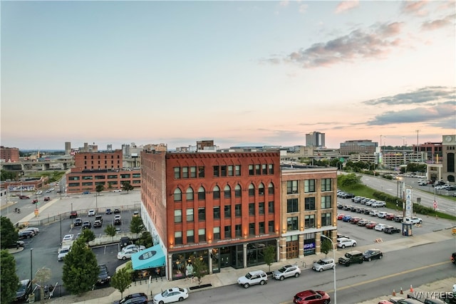 view of outdoor building at dusk