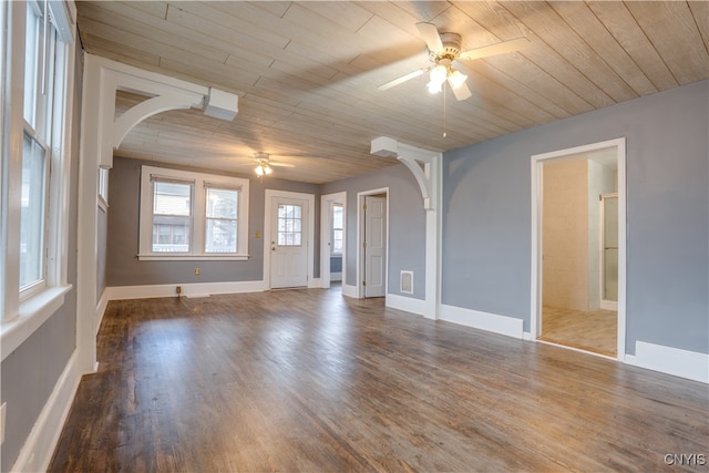 empty room featuring hardwood / wood-style flooring, ceiling fan, and wood ceiling