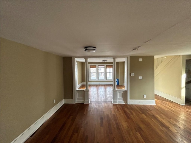 19 Jay St, Phelps, NY 14532 - empty room featuring ornate columns and wood finished floors