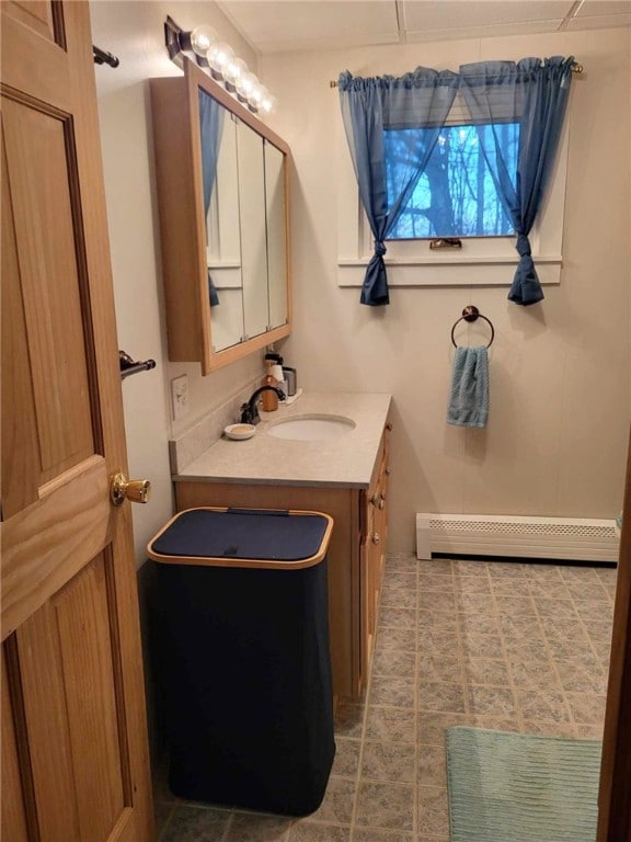 bathroom featuring vanity and a baseboard radiator