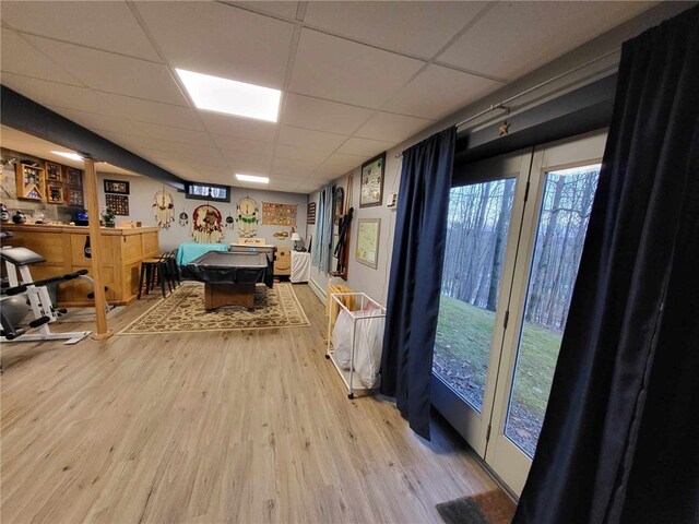 game room with a drop ceiling, wood-type flooring, and pool table