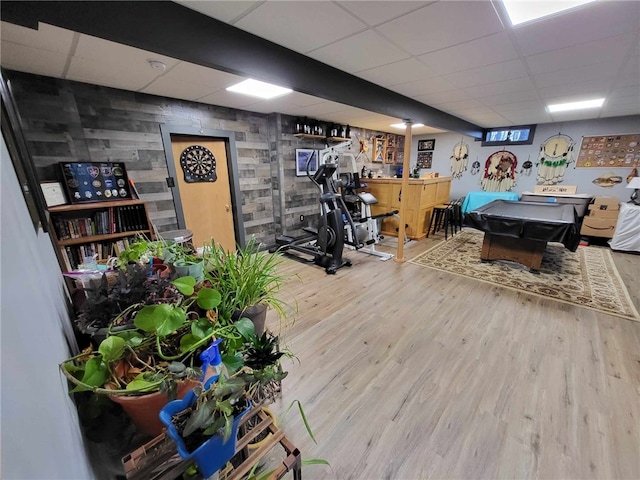 rec room featuring wood-type flooring, a drop ceiling, and billiards