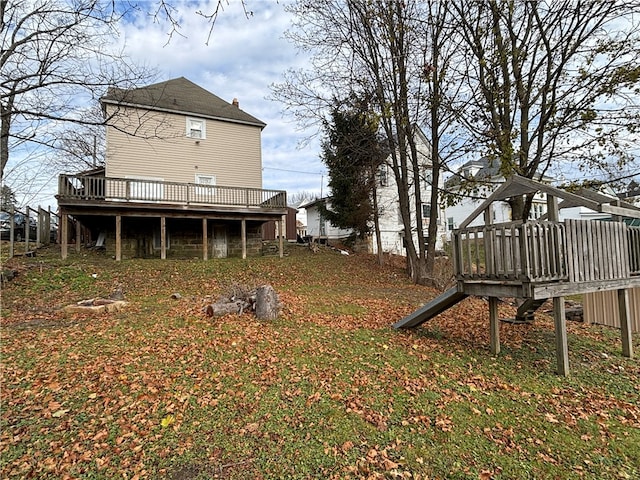 view of yard with a wooden deck