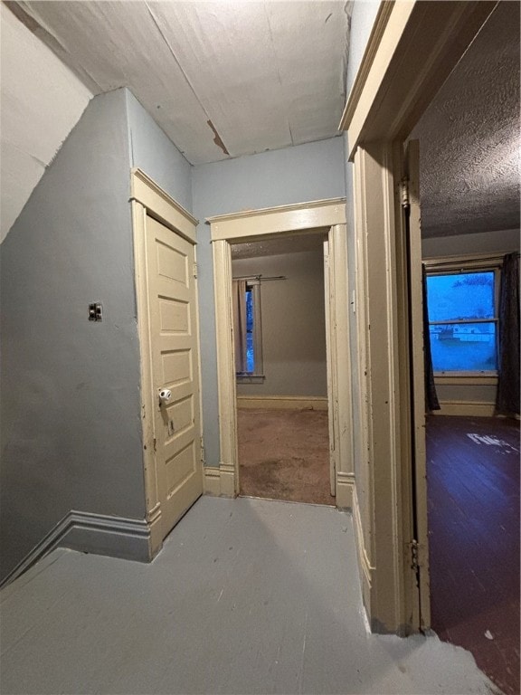 corridor with concrete floors