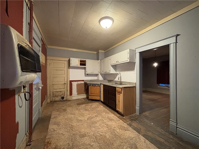 kitchen featuring white cabinets, sink, ornamental molding, dishwashing machine, and dark hardwood / wood-style flooring