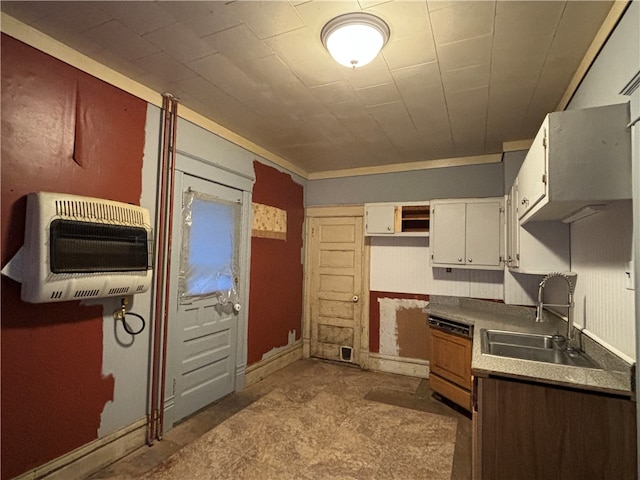 kitchen with dishwasher, heating unit, white cabinetry, and sink