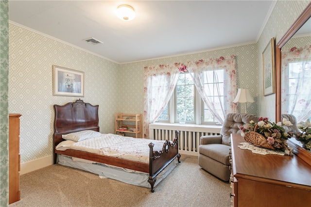 carpeted bedroom featuring ornamental molding