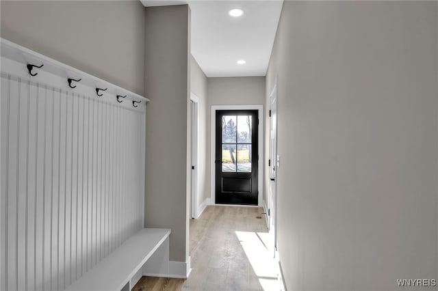 mudroom with light hardwood / wood-style flooring