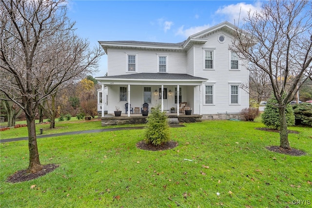 view of front of home featuring a porch and a front lawn