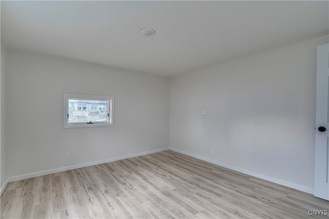 empty room featuring light hardwood / wood-style floors