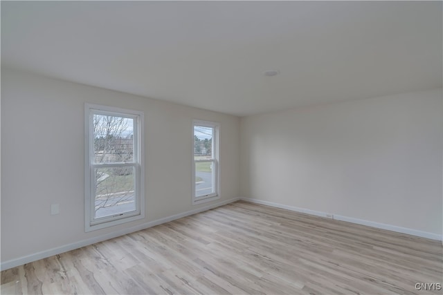 empty room featuring light hardwood / wood-style floors