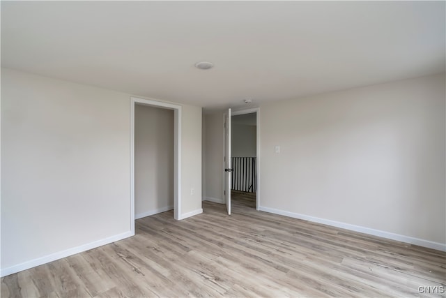 empty room featuring light hardwood / wood-style floors