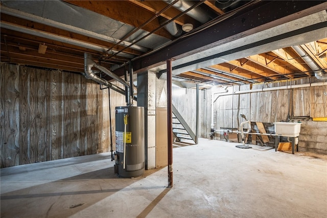 basement with sink and water heater