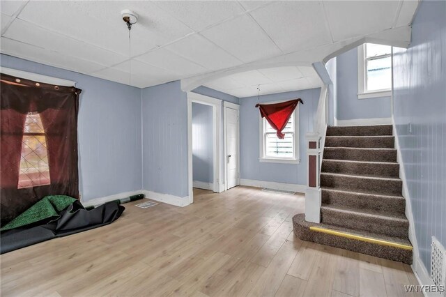 1857 Ontario Ave, Niagara Falls, NY 14305 - entryway featuring stairway, wood finished floors, and a paneled ceiling