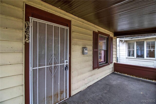 1857 Ontario Ave, Niagara Falls, NY 14305 - doorway to property featuring a porch