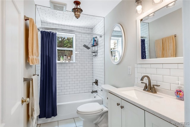 full bathroom with vanity, tile patterned flooring, toilet, tasteful backsplash, and shower / tub combo with curtain