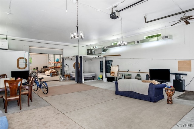 garage with ceiling fan and a garage door opener