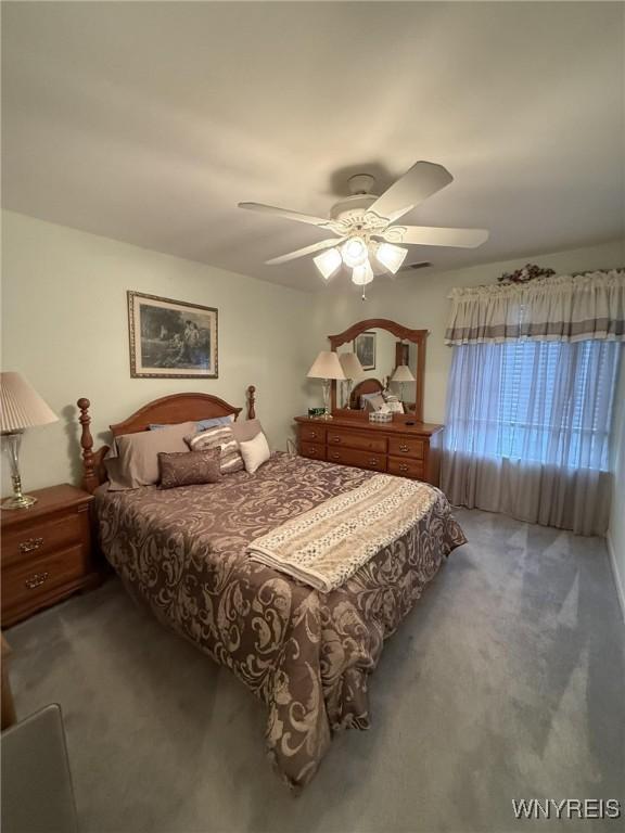 bedroom with carpet flooring and ceiling fan