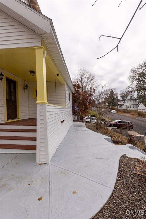 view of home's exterior featuring covered porch