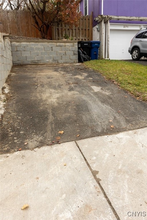 exterior space with a garage