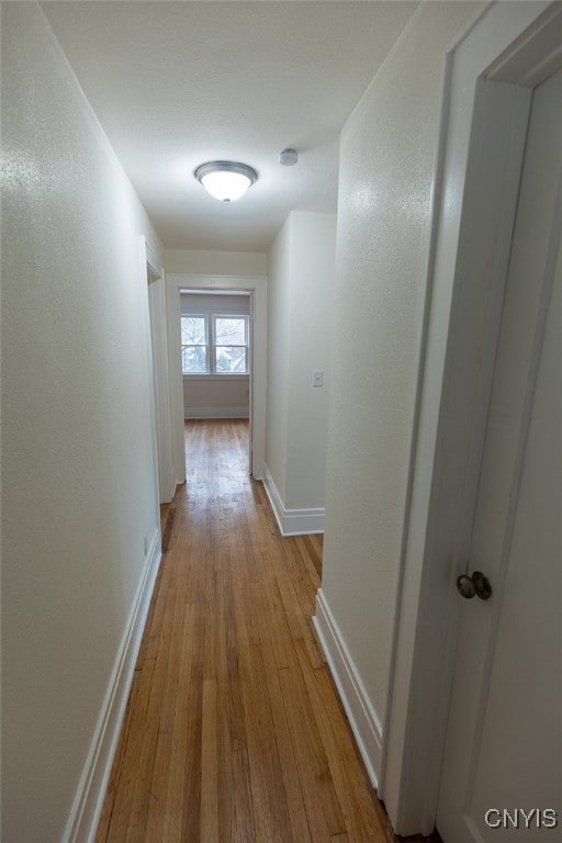 hall featuring light wood-type flooring