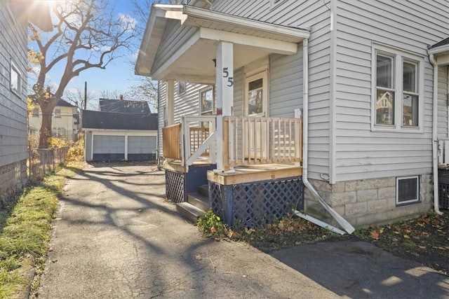 view of property exterior featuring covered porch