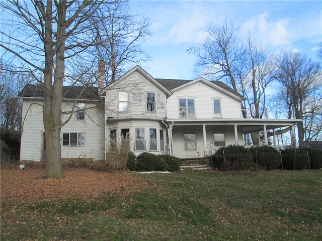 view of front of home with a front yard