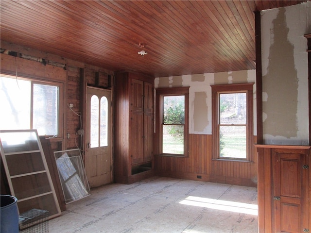 entrance foyer with wooden ceiling and a healthy amount of sunlight