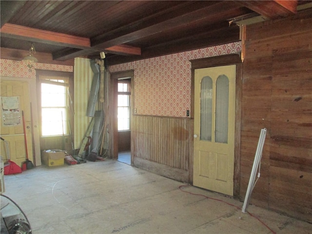 miscellaneous room featuring beam ceiling