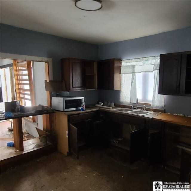 130/118 N Main St, New Albion, NY 14719 - kitchen with sink and plenty of natural light