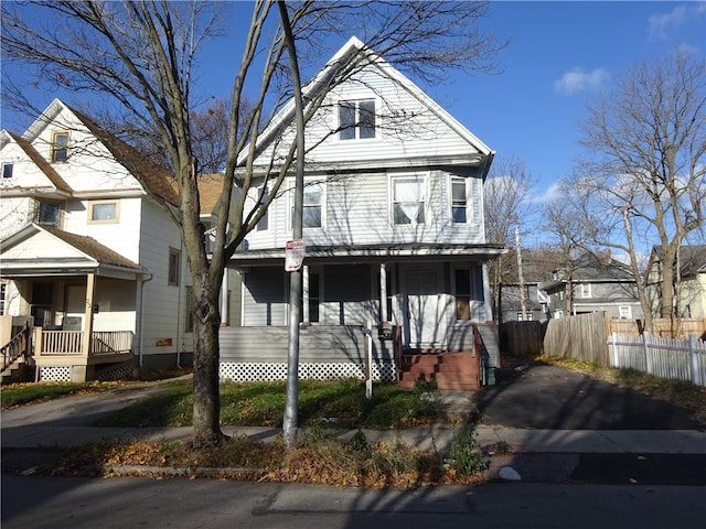 view of property with a porch