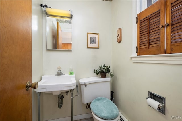 bathroom with sink and toilet